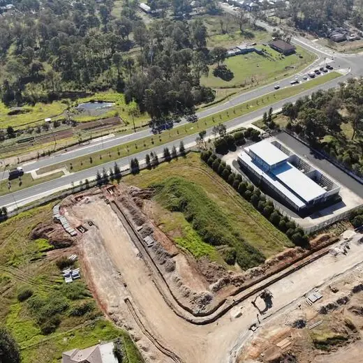 Aerial view of the subdivision beside the main road