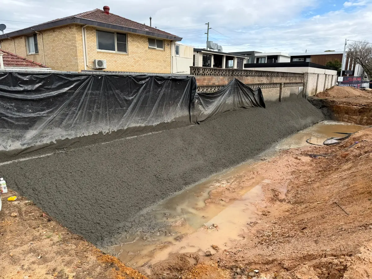 Shotcrete sprayed on a batter